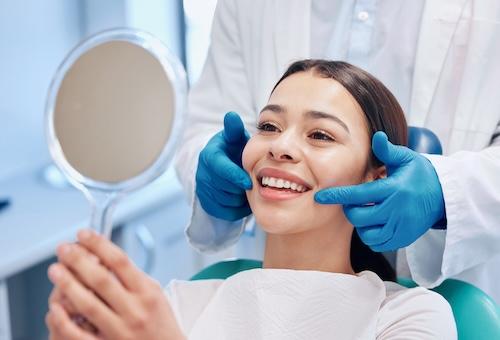 confident woman after her dental exam in ocala fl