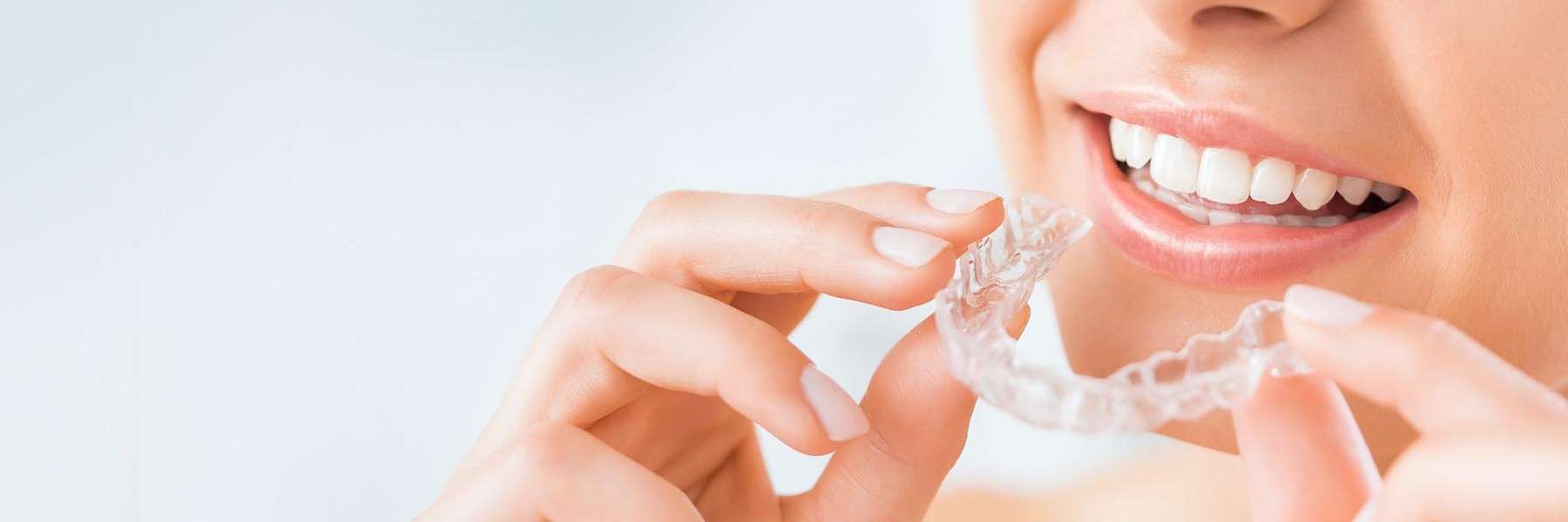 A woman in pain after getting a Invisalign® and Six Month Smiles® treatment in Ocala, FL