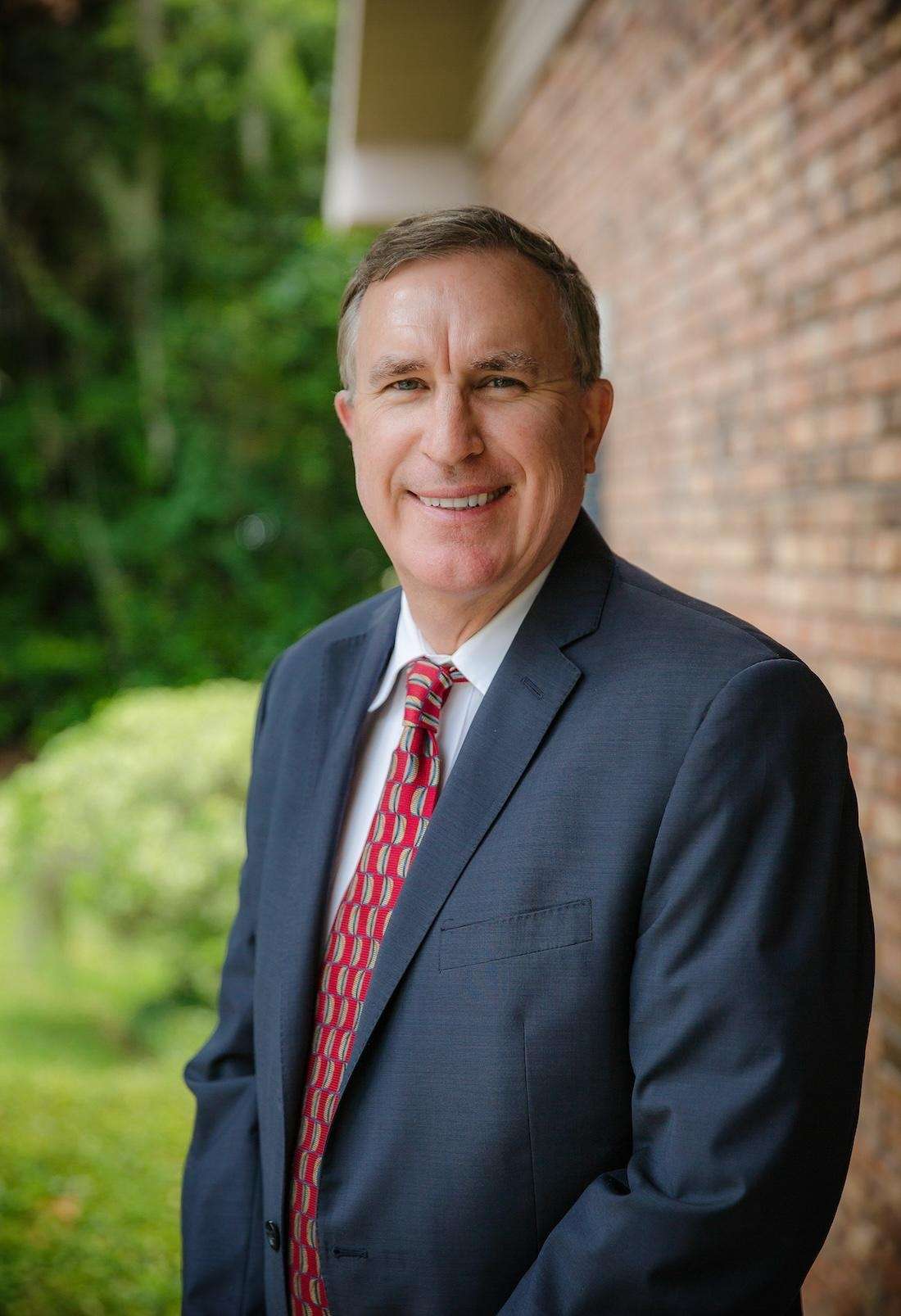 Lawrence J. Sutton , DDS