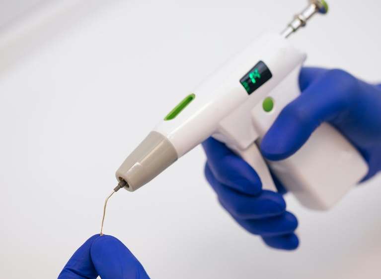 Close-up of rotary endodontics technology used for precise, minimally invasive treatment at Sutton Dentistry in Ocala, FL.